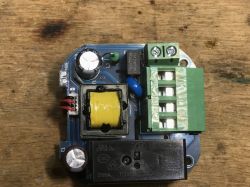 Thermostat Power Board with Electronic Components Power board with electronic components on a wooden background