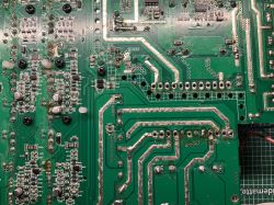 View of a circuit board with multiple traces and electronic components.