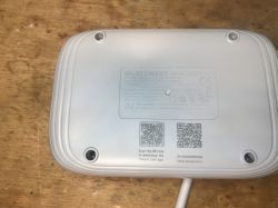 Bottom of WI-FI SMART POWERSTRIP Bottom of a power strip with technical data and QR codes