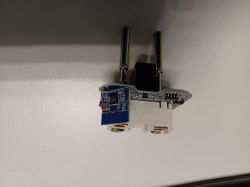 Interior of a 16A plug device with an energy meter after opening.