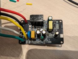 PCB Board with Motion Sensor and Connected Wires PCB board with electronic components and connected wires