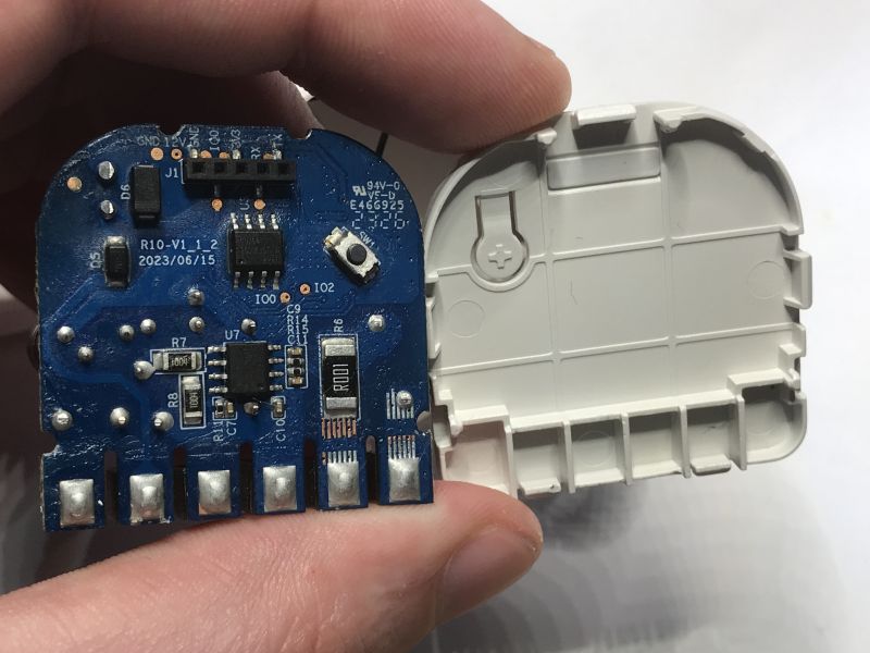 Refoss R10 PCB with programming header J1 and 2023/06/15 marking, cover removed