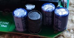 Electronic Components on a PCB Close-up of capacitors on a PCB.