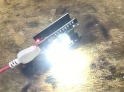 ESP32-Cam with Active LED Light ESP32-Cam with USB cable connected and LED light on