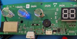 PCB section with coils, LED display, and solder pads highlighted in red box