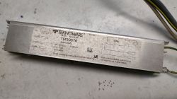 Teknoware TM30676 24V/36W metal ballast on a work surface, with label text and attached wires.