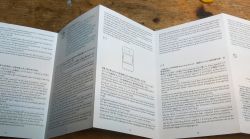 Sonoff POWR316D user manual spread out on a desk.