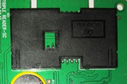 A footprint on a transparent surface, likely illustrating a smartcard reader.