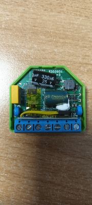 Electronic circuit board with capacitors, screw terminals, and SMD components