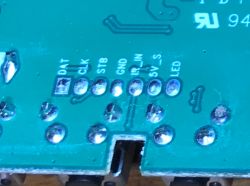 Connectors on Circuit Board Close-up of a circuit board with connectors labeled DAT, CLK, STB, GND, IR_IN, 5V_S, LED.