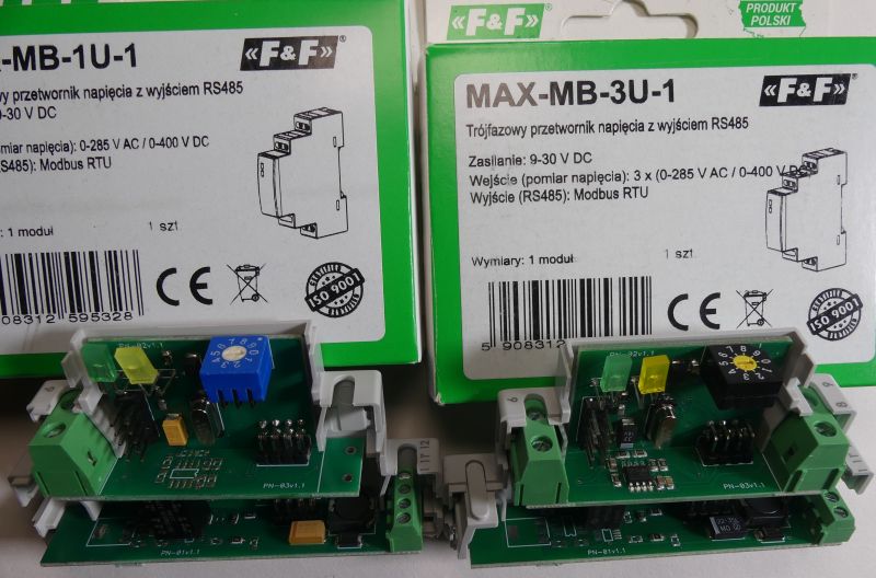 Dwa moduły elektroniczne do montażu na szynie DIN z widoczną płytką i opakowaniami producenta F&amp;F.