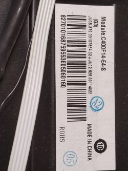 TV Module Label with Barcode Close-up of a TV module label with a barcode.