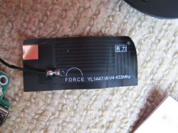 Black flexible antenna pad YL1447-W-V4 433MHz with FORCE written on it, placed on a carpet.
