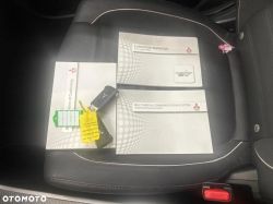 Car keys and Mitsubishi documents lying on a car seat.