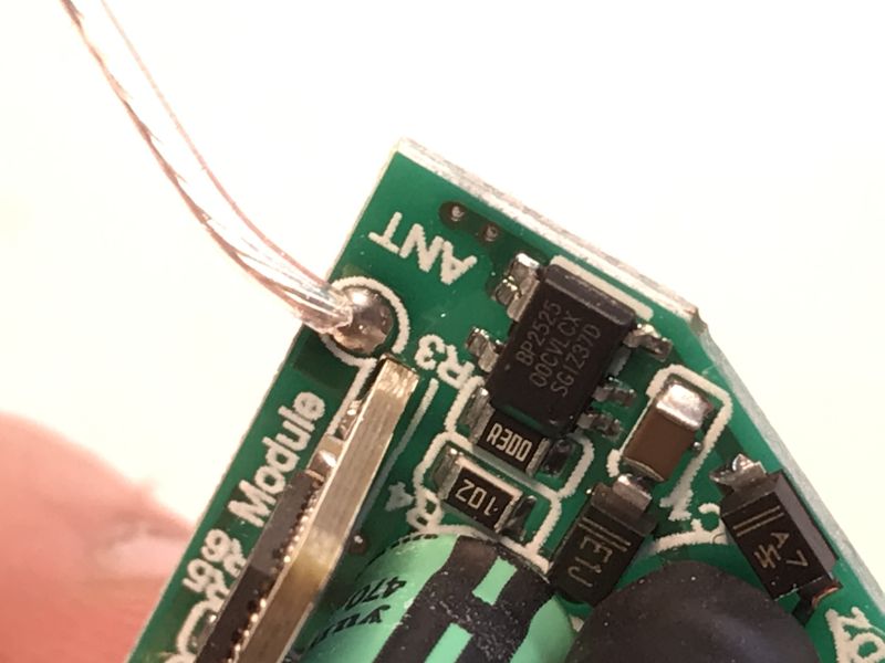 WiFi Module with Antenna and BP2525 Power IC on LED Board Close-up of a PCB with a WiFi module, antenna, and BP2525 power IC.
