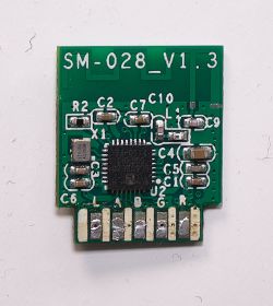 SM-028 circuit board version 1.3 with electronic components.