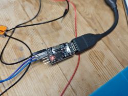 CH340 USB-TTL adapter connected to an external 3.3V power supply.
