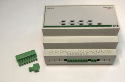 F&amp;Home home automation controller with green terminal connectors.