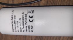 Product label on a white device with technical information.