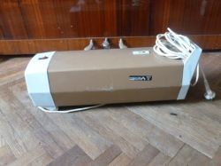 Choosing Between a Lamb Roller or Gun for Painting Plastered Outbuilding