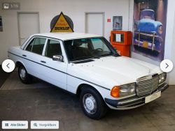 Biały klasyczny samochód Mercedes-Benz w garażu.