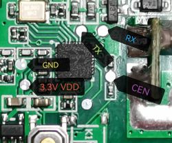 Close-up of a circuit board with pin labels: GND, 3.3V VDD, TX, RX, CEN.