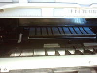 Brother DCP-7055 - Jak usunąć cienie na wydruku po wymianie tonera?