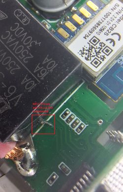 Close-up of a PCB with highlighted repaired MCU TX trace near CB2S module
