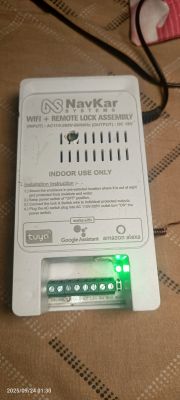 NavKar WiFi lock control module with green LED on patterned surface
