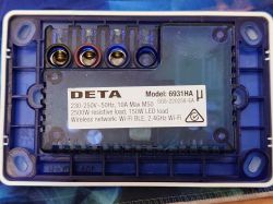 Back view of the Deta Grid Connect touchless hand switch, model 6931HA, showing the terminals and technical specifications label.