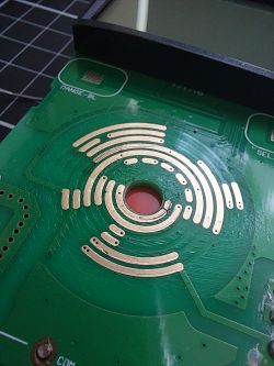 Clean Multimeter Switch Tracks Image of gold-plated tracks in a multimeter switch after cleaning.