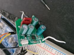 Electronic module on a printed circuit board Printed circuit board with electronic components connected to a breadboard.