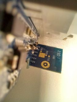 Close-up of a circuit board inside an electrical device.