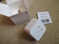 Smart Plug with User Manual Smart plug with packaging and user manual.