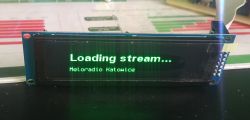 LCD display showing Loading stream... Meloradio Katowice.