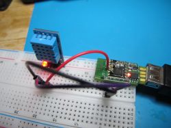 Small Air602 board connected to a breadboard with a DHT11 sensor.