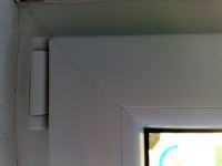 Plastic Double-Leaf Window (Movable Mullion): Wind Whistling & Blowing at Hinge, Upper Left Corner Plastic Double-Leaf Window (Movable Mullion): Wind Whistling & Blowing at Hinge, Upper Left Corner