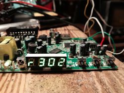 Green LED display on PCB board shows error code r302.