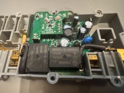 Wi-Fi electronic module with relays and capacitors in a plastic housing