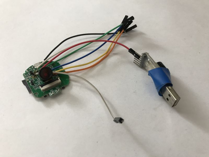 Camera module with multicolored wires connected to a USB adapter