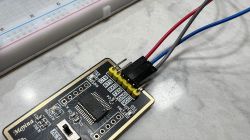 USB-UART Converter Connected to Breadboard USB to UART converter connected with wires to a breadboard.