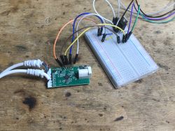 LED Strip Controller with TR6260S1 Microcontroller PCB with TR6260S1 microcontroller connected to a breadboard.