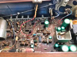 Interior of Unitra Sudety R-208 Radio Image of the interior of a radio showing the circuit board with various electronic components.