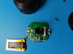 PCB and Components of A9 Mini Camera PCB of A9 mini camera with visible lens and battery.