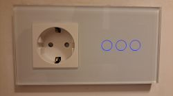 Three-color Bingoelec panel with EU socket and three touch switches.