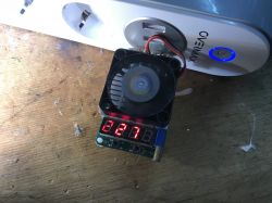 Overmax Flow Multi Control Power Strip Test Overmax Flow Multi Control power strip with a voltmeter showing 2.27 and a cooling fan.