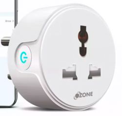 White smart plug with Ozone logo and blue LED, next to a smartphone.