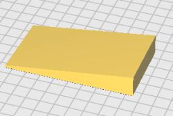Yellow trapezoidal wedge on a modeling grid in 3D design software