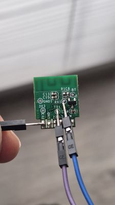Electronic module with jumper wires connected to labeled pins