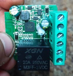Printed circuit board with electronic components, including an XGN relay.